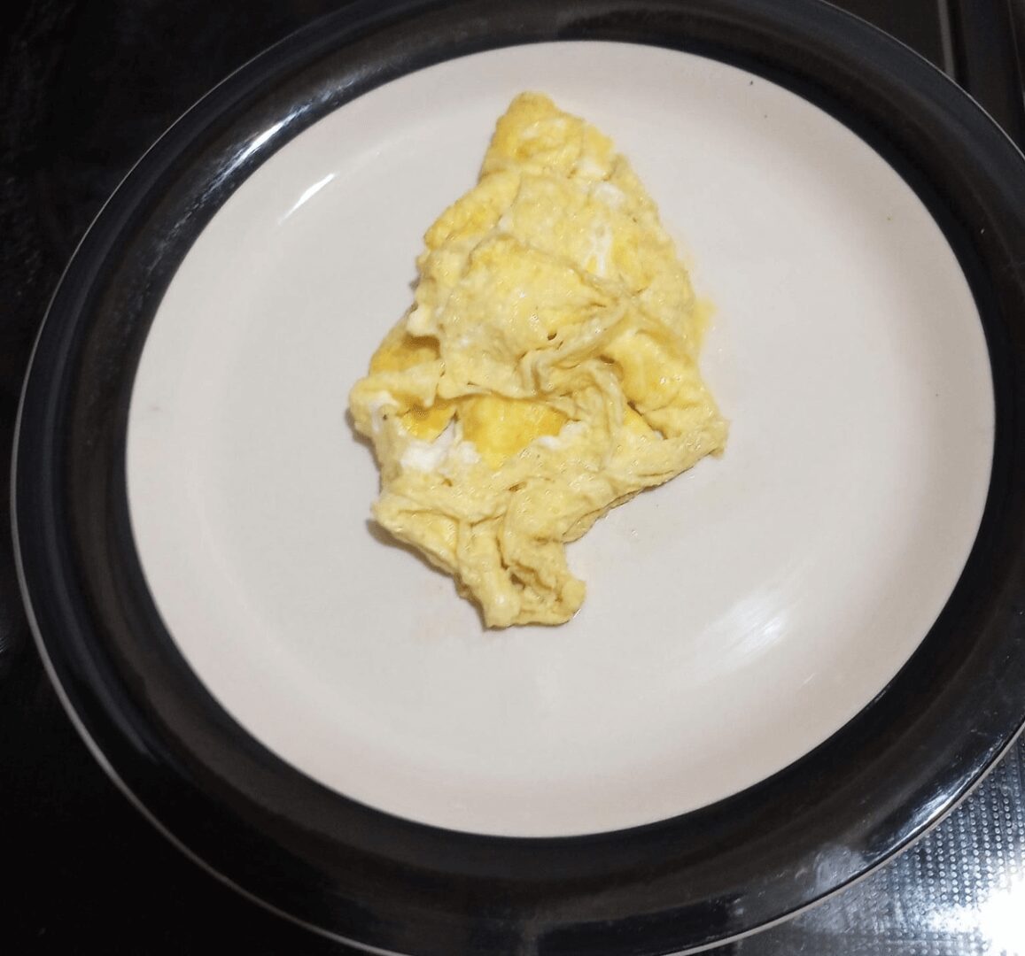 A plate of cooked omelet on the table
