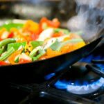 closeup shot of veggies being cooked